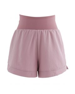 Shorts esportivo de cintura cruzada em rosa empoeirado
