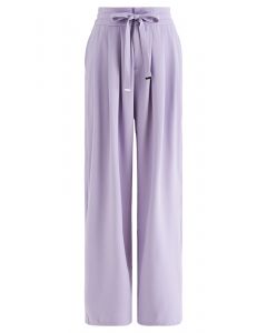 Calça larga com cordão e detalhe plissado na cintura lilás