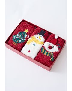 Caixa de presente com meias de boneco de neve