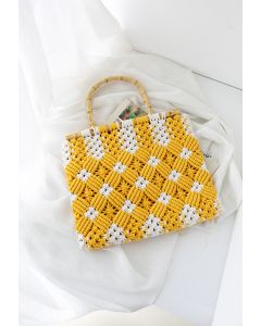 Bolsa de mão em tecido de dois tons com alça de bambu em amarelo